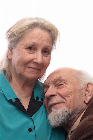 spirited lady - Senior couple, man reclined head on his wife's shoulder, isolated on white background Stock Photo - Budget Royalty-Free & Subscription, Code: 400-04940502