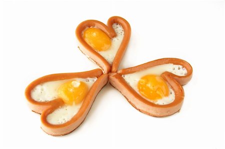 heart sausages with fried eggs for lovely breakfast  for Valentine's day or weekend Stock Photo - Budget Royalty-Free & Subscription, Code: 400-04940585