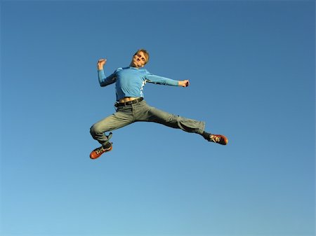 paha_l (artist) - man fly on blue sky Stockbilder - Microstock & Abonnement, Bildnummer: 400-04940610
