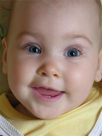paha_l (artist) - face baby smile with two teeths Stockbilder - Microstock & Abonnement, Bildnummer: 400-04940692