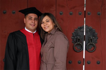 people successful college graduate with family - University graduate with his wife - happy and successful Stock Photo - Budget Royalty-Free & Subscription, Code: 400-04941065