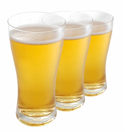simsearch:400-04953626,k - Three glasses of beer against white background Stock Photo - Budget Royalty-Free & Subscription, Code: 400-04941522