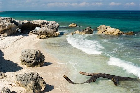 Rocks and waves in Isla Mujeres, Mexico. Stock Photo - Budget Royalty-Free & Subscription, Code: 400-04941941