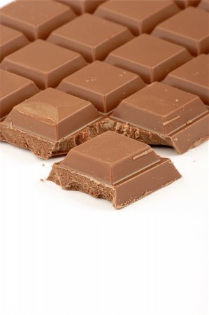 simsearch:400-04462092,k - Chocolate chunks against a plain background Stockbilder - Microstock & Abonnement, Bildnummer: 400-04942047
