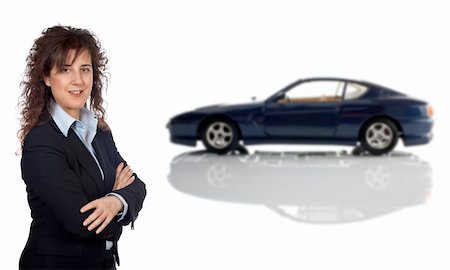 simsearch:694-03557973,k - Smiling business woman who is in front of a car reflected in the bottom. Car blurred Stockbilder - Microstock & Abonnement, Bildnummer: 400-04942705