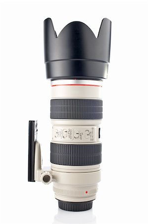 simsearch:400-04564986,k - Camera telephoto zoom reflected on the white background Photographie de stock - Aubaine LD & Abonnement, Code: 400-04942727