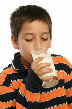 simsearch:400-04218582,k - Teenager enjoying a fresh glass of milk Photographie de stock - Aubaine LD & Abonnement, Code: 400-04942772