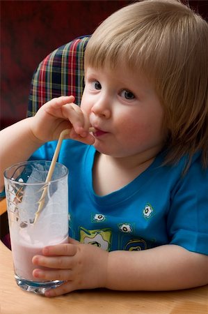 cute little girl drinking milky drink Stock Photo - Budget Royalty-Free & Subscription, Code: 400-04943665