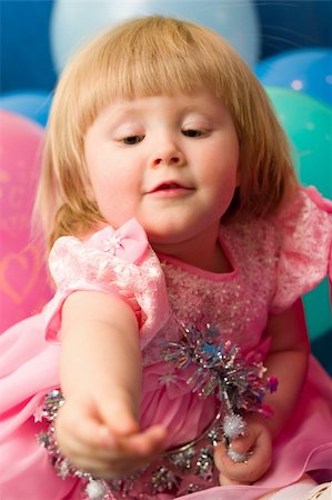 portrait of cute little girl in formal wear, soft-focused, focal point is on the face Stock Photo - Budget Royalty-Free & Subscription, Code: 400-04943663