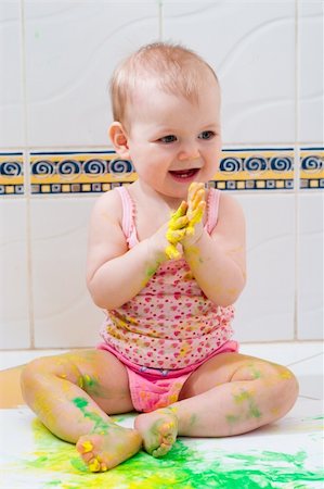 cute little baby playing with colorful paints Stock Photo - Budget Royalty-Free & Subscription, Code: 400-04943670