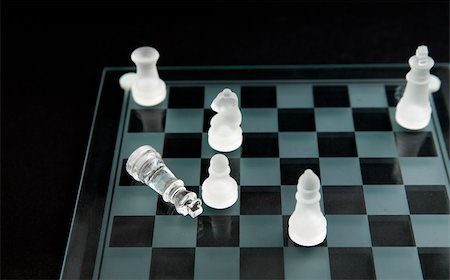 simsearch:400-04955785,k - glass chess - dead king lying on the chessboard Stock Photo - Budget Royalty-Free & Subscription, Code: 400-04943775