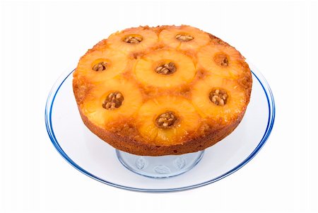 pineapple cake - Golden delicious pineapple upside down cake with walnuts Stock Photo - Budget Royalty-Free & Subscription, Code: 400-04943801