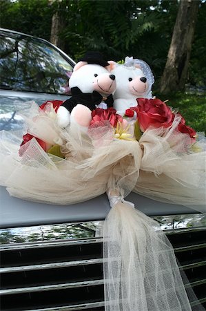 Silver wedding car with bridal bear and roses bouquet Stock Photo - Budget Royalty-Free & Subscription, Code: 400-04943935