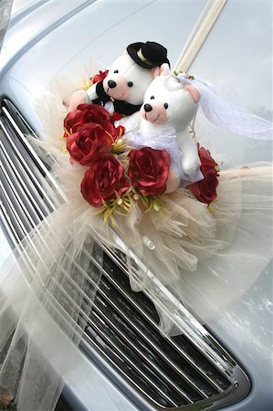 Silver wedding car with bridal bear and roses bouquet Stock Photo - Budget Royalty-Free & Subscription, Code: 400-04943933