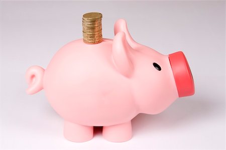 simsearch:400-04995456,k - Piggy bank with tower of coins Stockbilder - Microstock & Abonnement, Bildnummer: 400-04954032