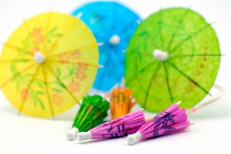 pastel cocktail umbrellas - paper parasols; differential focus Stock Photo - Budget Royalty-Free & Subscription, Code: 400-04954806