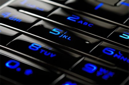 simsearch:400-04558697,k - Close up shot of blue mobile keypad under dark environment Stockbilder - Microstock & Abonnement, Bildnummer: 400-04955390