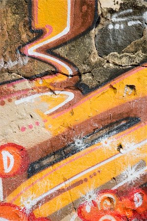 spritzlack - Concrete wall covered with graffiti. Stockbilder - Microstock & Abonnement, Bildnummer: 400-04955701