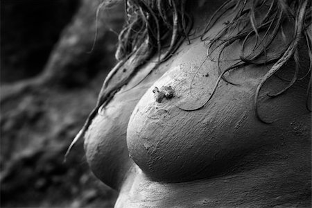 simsearch:400-03925003,k - Close up of  Caucasian female nude breasts covered in mud. Photographie de stock - Aubaine LD & Abonnement, Code: 400-04955797