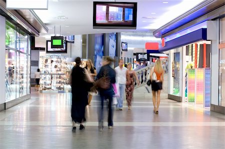 feet walking indoors - Shoppers at shopping center, motion blur Stock Photo - Budget Royalty-Free & Subscription, Code: 400-04955813