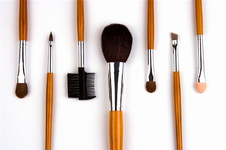 simsearch:400-08042102,k - Cosmetic brushes lined up in white background. Stock Photo - Budget Royalty-Free & Subscription, Code: 400-04955918