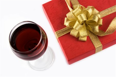racnus (artist) - Red wine and red gift box with golden ribbon. Fotografie stock - Microstock e Abbonamento, Codice: 400-04956137