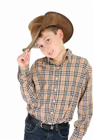 fashions cowboys for male - Child wearing a check shirt, belted denim jeans and a well worn leather cowboy hat. Stock Photo - Budget Royalty-Free & Subscription, Code: 400-04956140