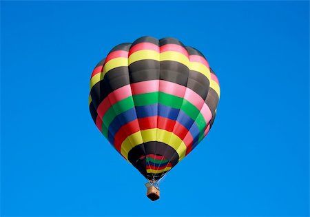 simsearch:400-08032526,k - Hot Air Balloon Isolated in the Blue Sky Foto de stock - Super Valor sin royalties y Suscripción, Código: 400-04956239