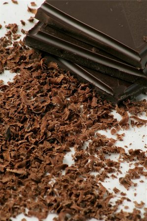 Grated dark chocolate and few chocolate pieces. Stock Photo - Budget Royalty-Free & Subscription, Code: 400-04956567