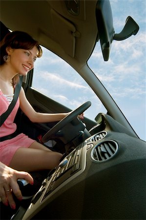 young happy woman driving a car Stock Photo - Budget Royalty-Free & Subscription, Code: 400-04956773