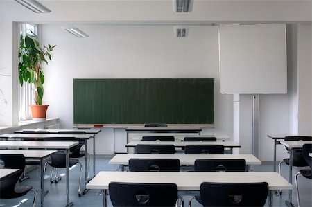 empty school chair - Empty Classroom from rear view. Stock Photo - Budget Royalty-Free & Subscription, Code: 400-04957079