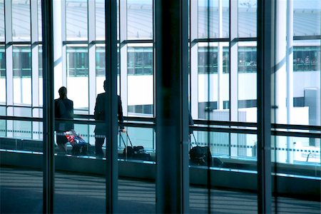 flight attendant walking - People walking at the airport with luggage Stock Photo - Budget Royalty-Free & Subscription, Code: 400-04957145