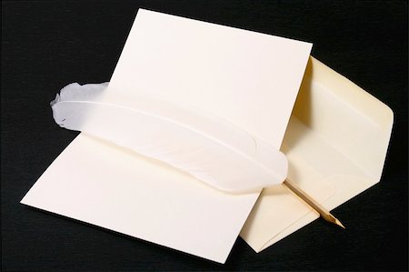 simsearch:400-06853377,k - Antique quill, envelope and blank card on a black background Stock Photo - Budget Royalty-Free & Subscription, Code: 400-04958021