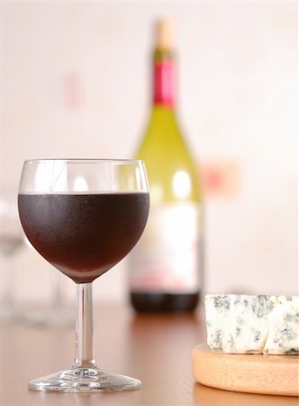 Glass of red wine with bottle & cheese Stock Photo - Budget Royalty-Free & Subscription, Code: 400-04958148