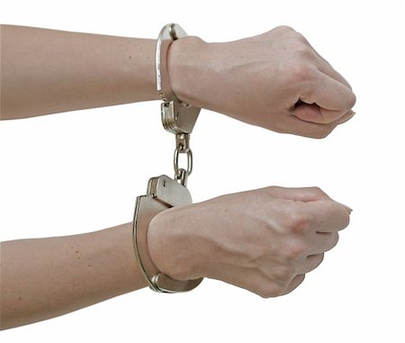 police officer catch - Handcuffs locked. Stock Photo - Budget Royalty-Free & Subscription, Code: 400-04958797