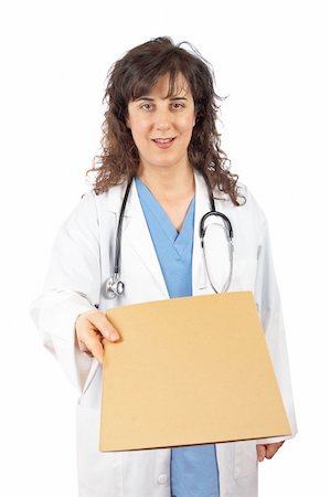 simsearch:400-07776701,k - Friendly female doctor in lab coat, handing a dossier over a white background Photographie de stock - Aubaine LD & Abonnement, Code: 400-04959153