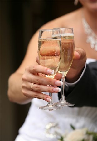 simsearch:400-03929021,k - Glass of champagne in a hand of the groom and bride Stock Photo - Budget Royalty-Free & Subscription, Code: 400-04959367