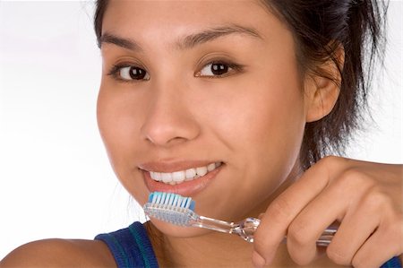 simsearch:400-04007612,k - Teenager girl brushes her teeth Stock Photo - Budget Royalty-Free & Subscription, Code: 400-04959656