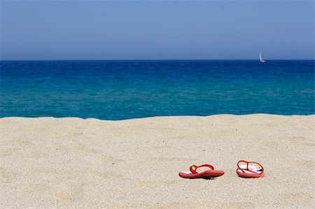 flip flops on empty sandy beach, corsica, mediterranean Stock Photo - Budget Royalty-Free & Subscription, Code: 400-04959681