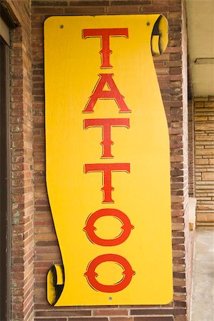 Tattoo sign outside of tattoo parlor. Stockbilder - Microstock & Abonnement, Bildnummer: 400-04950326