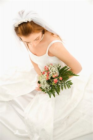 simsearch:400-04950359,k - Portrait of a Caucasian bride holding bouquet. Stock Photo - Budget Royalty-Free & Subscription, Code: 400-04950596