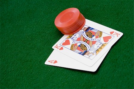 close up of cards and chips on green felt with winning hand Stock Photo - Budget Royalty-Free & Subscription, Code: 400-04950724