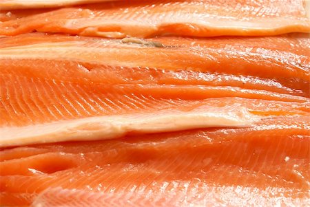 salmon trout dish - Fresh crude sliced trout filet background close-up. Stock Photo - Budget Royalty-Free & Subscription, Code: 400-04950765