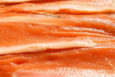 simsearch:400-07044537,k - Fresh crude sliced trout filet background close-up. Foto de stock - Super Valor sin royalties y Suscripción, Código: 400-04950765