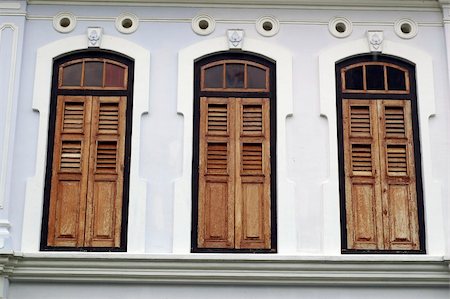 Brown Wood windows in one of old british colonial building. Stock Photo - Budget Royalty-Free & Subscription, Code: 400-04951120