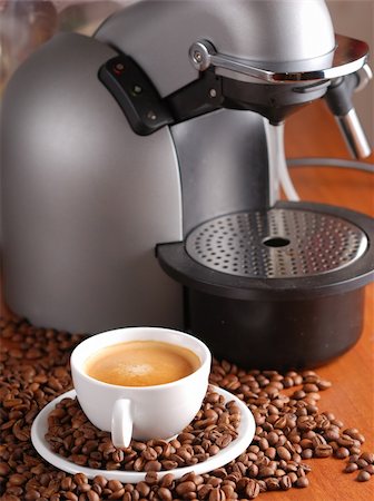 expresso maker - Coffee machine and cup of espresso. Spilled out coffee beans. Stock Photo - Budget Royalty-Free & Subscription, Code: 400-04952414