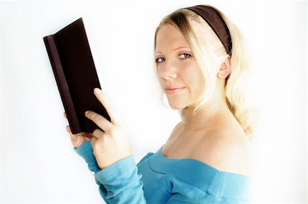 people laughing magazine - A young, blond woman is reading a book Stock Photo - Budget Royalty-Free & Subscription, Code: 400-04953110
