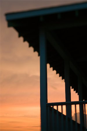 simsearch:400-03923118,k - Beachfront porch silhouetted at sunset Fotografie stock - Microstock e Abbonamento, Codice: 400-04953123