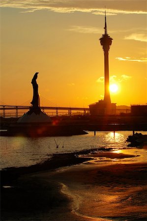 The sunset and Kun Iam statue and Macau Tower Convention Stock Photo - Budget Royalty-Free & Subscription, Code: 400-04953411