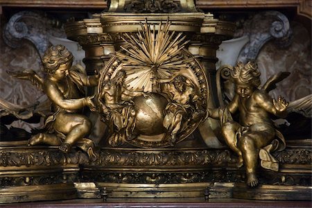 st peters basilica inside - Sculpture of cherubs and Creation in Saint Peter's Basilica, Rome, Italy. Stock Photo - Budget Royalty-Free & Subscription, Code: 400-04953907